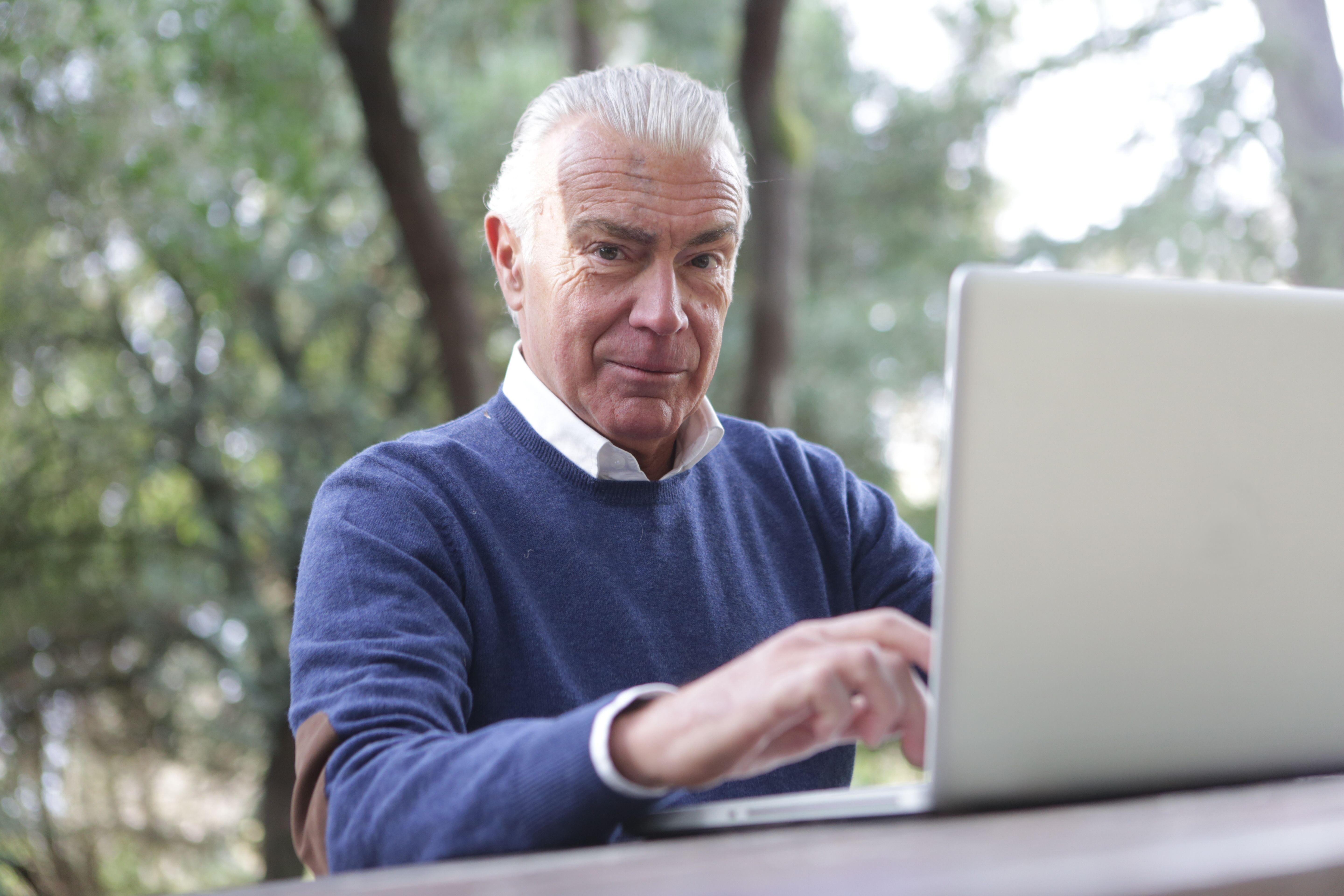 School administrator using MIS software on computer